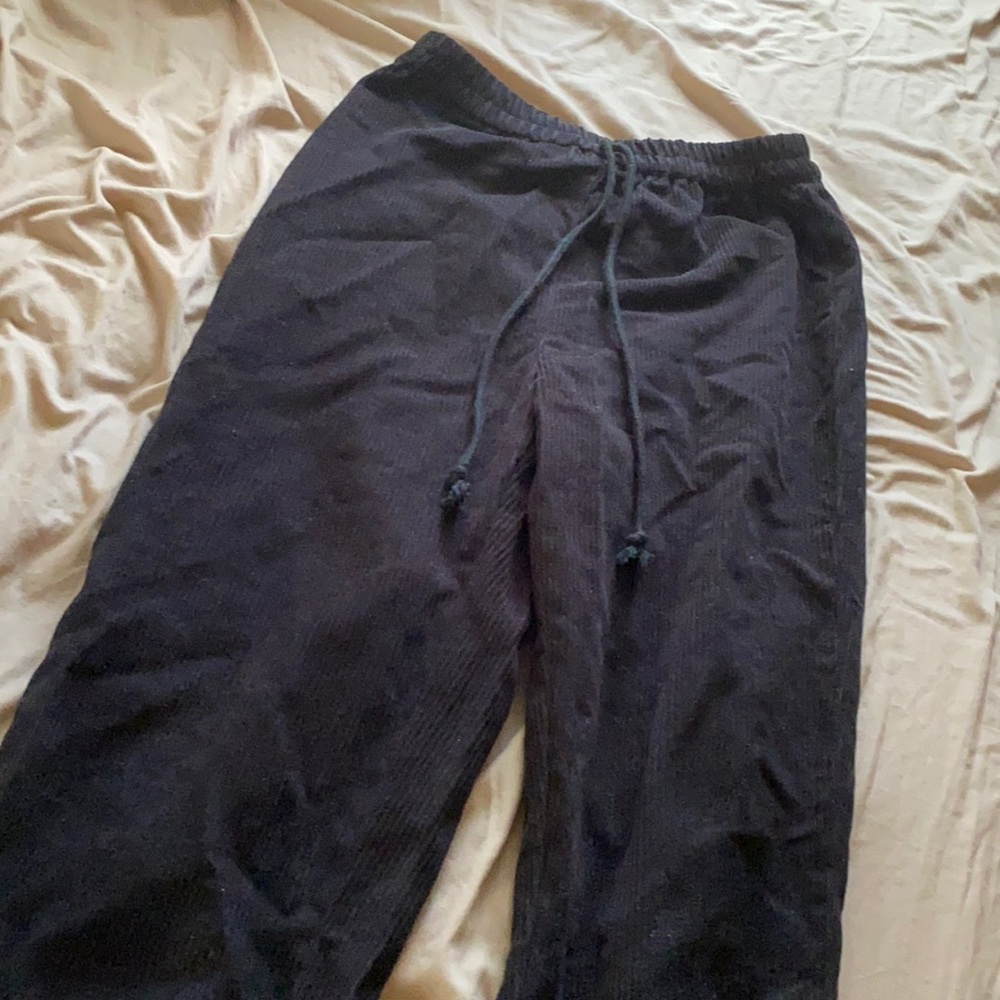 Black sweat pants with draw sting